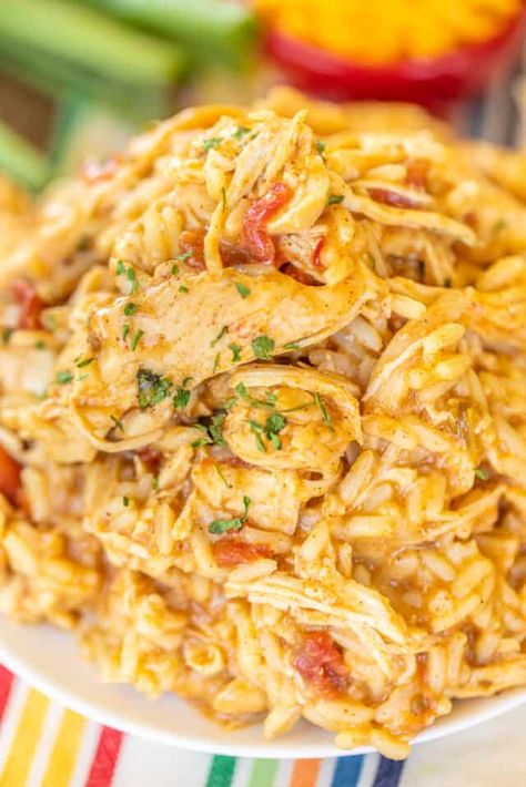 Slow Cooker Taco Chicken & Rice - Plain Chicken Taco Chicken And Rice, Slow Cooker Taco Chicken, Slow Cooker Chicken And Rice, Chicken And Rice Crockpot, Slow Cooker Taco, Taco Chicken, Mexican Chicken And Rice, Chicken And Rice Recipe, Taco Toppings