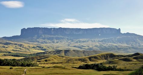 Mount Roraima, as seen from Gran Sabana, Venezuela. Mount Roraima is the highest of the Pakaraima chain of tepui plateau in South America. The mountain also serves as the triple border point of Venezuela, Brazil and Guyana. The table-top mountains are considered some of the oldest geological formations on Earth, dating back to some two billion years ago in the Precambrian. Click on this image and on the next two images for a real close-up look. Monte Roraima, Mount Roraima, The Lost World, Oscar Niemeyer, Angkor Wat, Stonehenge, Beautiful Places In The World, Angkor, Beautiful Places To Visit