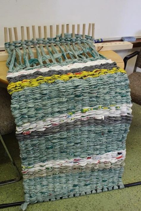 Plastic bags woven into sleeping mats for Fredericton's homeless | CBC News Plarn Sleeping Mats, Mats Made Out Of Plastic Bags, Reuse Plastic Bags, Plastic Bag Crafts, Plastic Yarn, Plastic Bag Crochet, Fused Plastic, Woven Mat, Upcycle Plastic