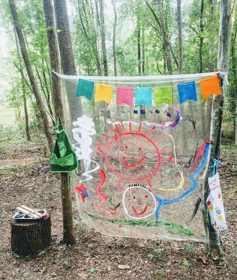 A clear shower curtain between trees makes for hours of painting entertainment. Add a bit of dish soap to your paints to make them wash off easier! Shower Curtain Painting, Curtain Painting, Clear Shower Curtain, Mud Play, 1000 Hours Outside, Eyfs Outdoor, Girl Scout Daisies, Camping Crafts For Kids, Fairy Circle