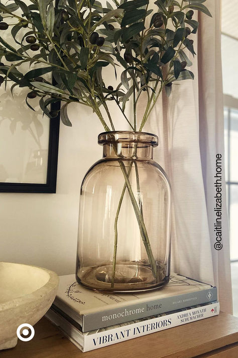 Update any corner of your home with this statement glass vase. The warm, tinted glass is so subtle & versatile, it’ll go with any decor aesthetic. Arrange a faux flower bouquet to instantly liven up any big or small space. Large Glass Vases Decor Ideas, Glass Vase Filler Ideas, Glass Vases Decor Ideas, Small Corner Decor, Vase Decorating Ideas, Brown Glass Vase, Vase Aesthetic, Big Vase, Moody Living Room