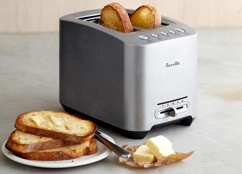 The 11 Best 2-Slice Toasters for Waffles, Pop-Tarts and More #purewow #appliances #home #kitchen #food Cinnamon Raisin Bagel, Bread Toaster, Stainless Steel Toaster, Toaster Pastry, Smart Oven, Rice Cookers, Toasters, Types Of Bread, Slow Cookers