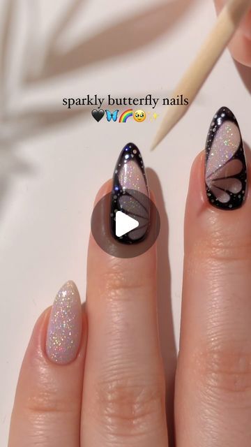 Paula 💅🏻🌙💗 on Instagram: "holographic butterfly nails! 🦋🖤🌈✨ i originally was going to just paint on some white dots to complete the butterfly look but then i found these fun tiny holographic glitters on my desk & thought i could add them instead! <3 — using: • @daily_charme  holographic cat eye gel “UniKitty” 🌈 black gel polish “Perfect Black” 🖤 • use my code PAULA10 for 10% off! 💸 paid content // paid to create  #butterflynails #holonails #sparklynails #summernails #coolnails #nailart #nailarttutorial #nailinspo #naildesign #diynails #reels" White Cat Eye Nails, Butterfly Nails Design, Butterfly Nail Art Designs, Nail Art Butterfly, Black Gel Polish, Holographic Butterfly, Butterfly Nail Designs, Nail Tutorial Videos, Holo Nails