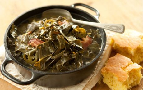 Trust us, you'll want to serve these tender, spicy braised greens with cornbread on the side so that you can crumble it into the bowl to soak up the "pot likker". Pot Likker, Spicy Collard Greens, Sauteed Collard Greens, Classic Cajun Recipes, Smoked Turkey Wings, Braised Greens, Southern Greens, Collard Greens Recipe, New Years Eve Food