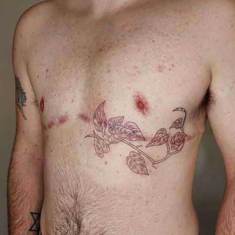 Top Surgery Tattoo Flower, Top Surgery Scar Tatoos, Male Pelvic Tattoo, Trans Ftm Tattoo Ideas, Trans Masc Chest Tattoos, Post Top Surgery Tattoos, Ftm Scar Tattoo, Top Surgery Ftm Tattoo, Queer Tattoos Ideas