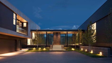 Contemporary hillside house connected to its surroundings in Colorado Connected Houses Architecture, 2 Connected Houses, Two Connected Houses, Hillside House Exterior, 2 Houses Connected, Conjoined Houses, House Design Hillside, Breezeway Entrance, House With Bridge