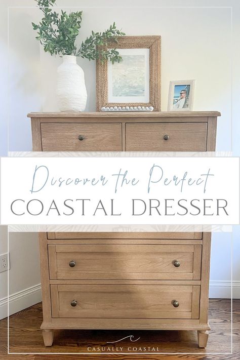 Looking for a coastal dresser or dresser decor ideas? Discover the perfect options to complete your bedroom space! via @casuallycoastal Dresser Decor Ideas, Coastal Dresser, Natural Wood Dresser, Primary Bedrooms, Light Wood Dresser, Tall White Vase, Lakehouse Bedroom, Dresser Hardware, Bedroom Paint Colors Master