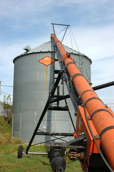 Auger and Grain Bin During Harvest. Orange augur and silver grain bin during Iow #Sponsored , #AD, #ad, #Bin, #Auger, #Orange, #Harvest Business Card Branding, Harvest Season, Stock Photography, Photo Image, Logo Design, Stock Photos, Design