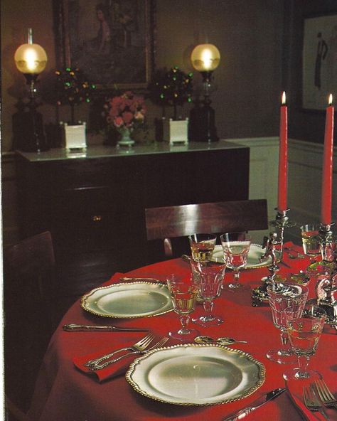 I love this vintage Christmas photo : The red tablecloth, the dark wooden of the chairs and the silver candelabras with cherubs… so elegant… | Instagram Red Table Settings, Candle Tablescapes, Elegant Instagram, Vintage Table Setting, Silver Candelabra, Vintage Christmas Photos, Dining Table Cloth, Red Tablecloth, Wedding Tablecloths