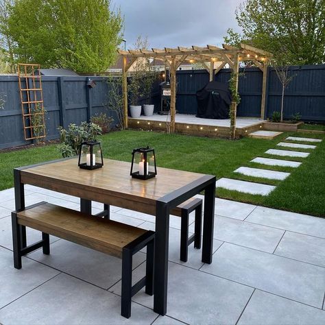 Jonny Sloane on Instagram: "Garden Transformation 🙌🏼 Gone is the new build strip of turf and replaced with a usable space. The garden feels so much bigger! I can’t wait to enjoy the space over the summer🌳 ☀️ #gardentransformation #gardendesign #gardeninspo #garden #zen #gardenfurniture #patio #porcelainpaving #pagoda #firepit #outdoorlighting #plants #gardenstyle #outdoorstyle #bbq #pizzaoven #pavingstonesdirectuklimited #stormgrey @brierdale_landscapes @jack.griff @paving_stones_direct_uk_lt New Build Garden Ideas, Modern Garden Patio, Turf Backyard, Garden Transformation, Small Garden Landscape, Small Patio Garden, Modern Backyard Landscaping, Back Garden Design, Patio Garden Design