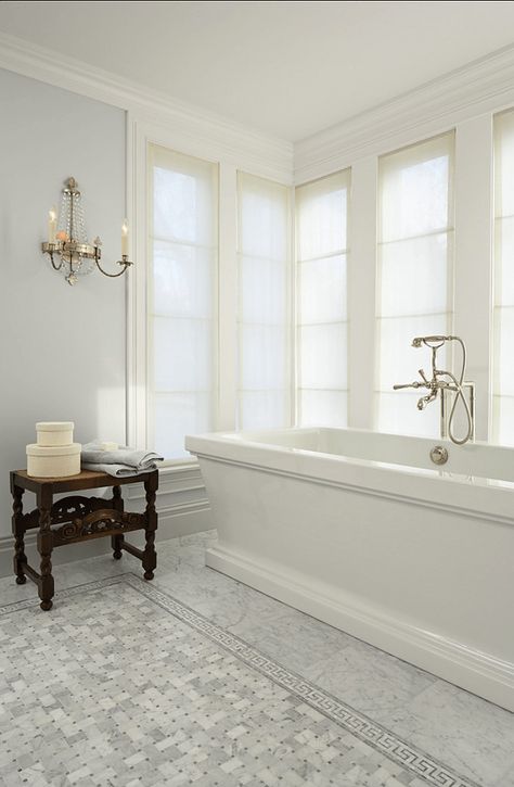 9 Fabulous Benjamin Moore Cool Gray Paint Colors - laurel home | Murphy Co. Design   Susan Gilmore [photo]    interior design – Marita Simmons | beautiful classic bathroom with pale gray walls and Carrera Marble Benjamin Moore Horizon, Floor Tile Design, Grey Paint Colors, Classic Bathroom, Interior Design Photos, Subway Tiles, Bad Design, Design Del Prodotto, Bathroom Floor Tiles