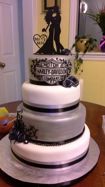 Harley Davidson wedding cake Harley Davidson Wedding Dresses, Biker Wedding Ideas Dresses, Harley Wedding Ideas, Harley Davidson Wedding Cake, Moto Wedding, Harley Davidson Wedding Ideas, Motorcycle Wedding Ideas, Biker Wedding Ideas, Harley Wedding