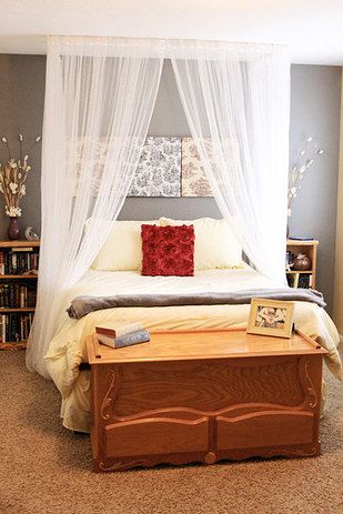 DIY a cozy canopy by hanging fabric from the ceiling. | 17 Ways To Make Your Bed The Coziest Place On Earth Curtain Over Bed, Canopy Bed Diy, Canopy Bedroom, Diy Canopy, Decor Ikea, Christmas Outdoor, Luxurious Bedroom, Bed Canopy, Romantic Bedroom