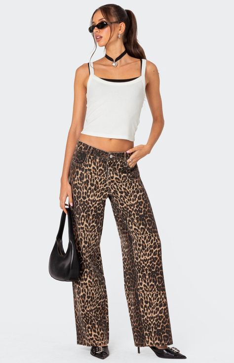 Get ready to unleash your wild side with the Edikted Leopard Printed Low Rise Jeans! Crafted from comfortable cotton, these jeans feature a low-rise waist for a flattering fit. With their eye-catching leopard print, they add a bold and stylish edge to any outfit. Perfect for those who dare to stand out, these jeans are sure to make a fierce statement wherever you go.JeansLow rise waistPrinted fabric100% CottonModel wears size SModel height is 5'7Item care: Wash with similar color Edikted Womens Tank Top Layered, Womens Low Rise Jeans, Womens White Jeans, Visionary Fashion, School List, Low Rise Pants, Black Jeans Women, High Waisted Flare Jeans, Summer Closet