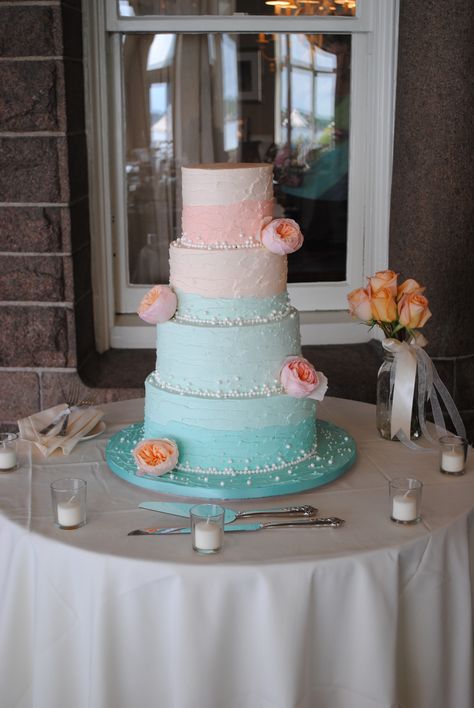 Beach themed turquoise and peach ombre wedding cake with pearl accents www.queenbcakery.com Johnston, RI Coral And Turquoise Wedding Cake, Turqoise Wedding, Teal Beach Wedding, Mint Green Wedding Cake, Peach Gold Wedding, Turquoise Wedding Cake, Salmon Wedding, Coral Wedding Cakes, Beach Birthday Cake