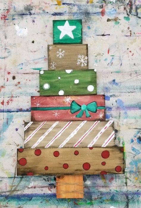 Palette Christmas Tree Diy, How To Decorate A Wooden Pallet Christmas Tree, Painted Wood Trees Christmas Decorations, Wooden Christmas Trees Painted, Wood Christmas Tree Paint Ideas, Wood Plank Christmas Tree, Wood Christmas Diy Projects, Wood Christmas Tree Crafts, Wood Block Christmas Tree