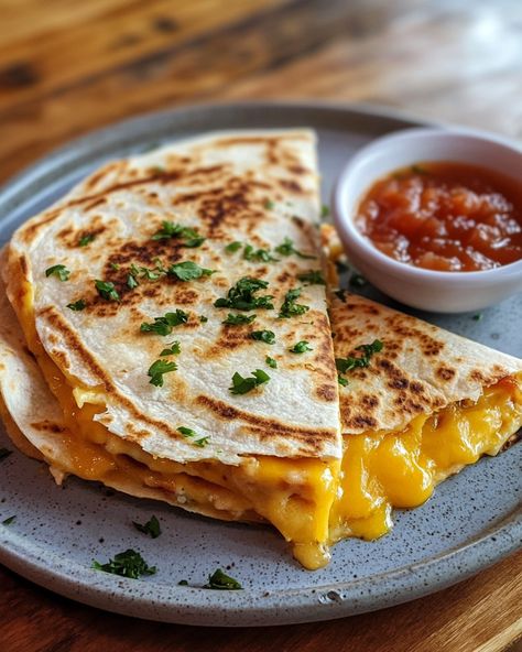 This breakfast quesadilla is a hit every morning! Everyone loves digging into this cheesy delight.   Ingredients: - 2 flour tortillas - 1 cup shredded cheese (like cheddar or Monterey Jack) - Salsa  For the rest of the ingredients and details, Link in first comment [👇] [👇]  This is the perfect way to start your day. Enjoy your cheesy morning surprise!   #BreakfastQuesadilla #CheesyDelight #MorningFuel #QuickBreakfast #TastyEats Quesadilla Pictures, Cheesy Quesadilla, Budget Dinner, Breakfast Quesadilla, Cheese Quesadilla, Bacon Sausage, Dinner On A Budget, Quinoa Salad Recipes, Quesadilla Recipes