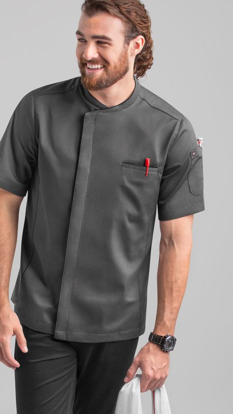 This chef coat includes a pocket on the chest and the left sleeve. Back mesh panels and back yoke details complete the look of this modern chef coat Kitchen Uniform Ideas, Chef Coats Mens, Chefs Jacket Design, Chef Jacket Design Men, Chef Coat Design Men, Chefs Coat, Chef Coat Design, Chef Jackets Design, Chefs Jacket