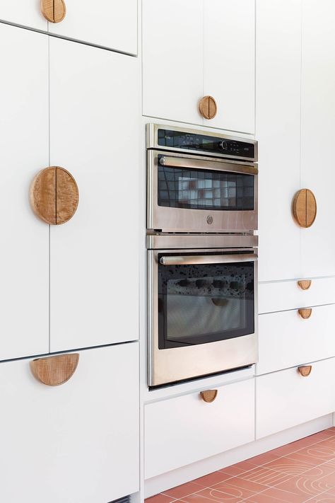 Tiny U Shaped Kitchen, Terrazzo Counter, Colorful Kitchen Backsplash, Peach Kitchen, Double Door Refrigerator, Tropical Living, U Shaped Kitchen, Cupboard Handles, Orange Walls