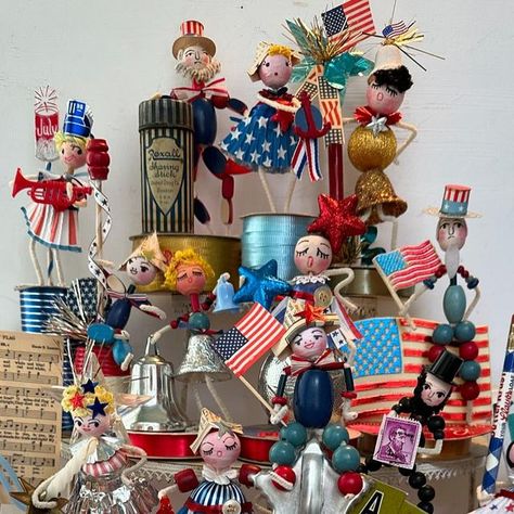 Magpie Ethel on Instagram: "That patriotic parade is in full march out of my studio.  First up is the spun head assortment with every collected doodad to add extra charm.  Note Uncle Sam with the Yankee pipe filter box…I used the pipe filters as his legs (white lower half). More red, white and blue to come.  No Etsy date yet, but probably first part of June.  #magpieethelfourthofjuly2024etsy #vintageredwhiteandblue #vintagepatriotic #vintagefourthofjuly" Magpie Ethel, Vintage Christmas Crafts, Uncle Sam, Magpie, Red White And Blue, Fourth Of July, Vintage Christmas, Christmas Crafts, Red White