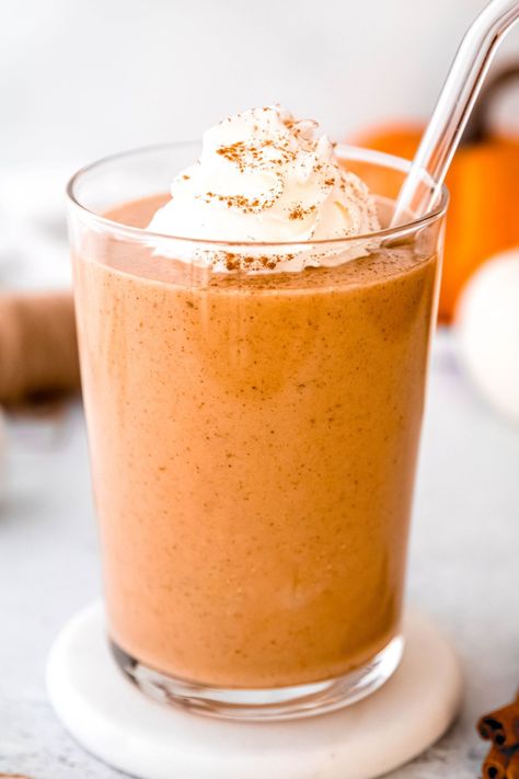 Indulge in the flavors of fall with this Pumpkin Protein Shake! Packed with 35g of protein, this shake is a perfect post-workout treat or breakfast option. Featuring pumpkin puree with a hint of pumpkin spice, banana, & protein powder, it's creamy & delicious. Enjoy the cozy, autumnal goodness of a pumpkin pie in a glass, while keeping your health goals on track. Sip your way to a healthier, tastier day with this easy-to-make pumpkin protein smoothie! Vegan instructions included. Pumpkin Cheesecake Protein Shake, Premier Pumpkin Protein Shake Recipes, Pumpkin Spice Protein Shake, Pumpkin Protein Smoothie, Pumpkin Pie Protein Shake, Pumpkin Protein Shake, Pumpkin Shake, Health Shakes, Premier Protein Shakes