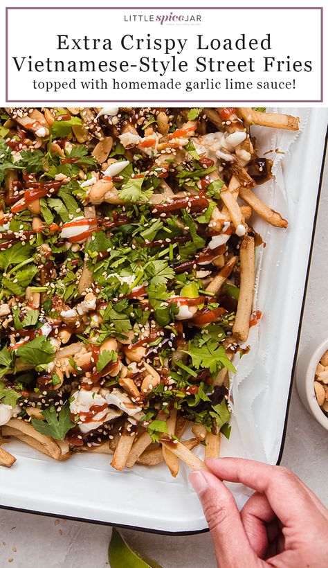 Crunchy and so flavorful! Vietnamese-Style Street Fries start with Alexia® House Cut Fries with Sea Salt that are topped with three sauces, chopped peanuts, toasted sesame seeds, and fresh cilantro. #streetfries #quicksnack #snackrecipes #loadedfries #vietnamesefries | Littlespicejar.com Street Fries, Recipes Vietnamese, Oven Baked Fries, Yellow Squash Casserole, Vietnamese Style, Frozen Potatoes, Vegan Fish, Most Popular Pins, Loaded Fries