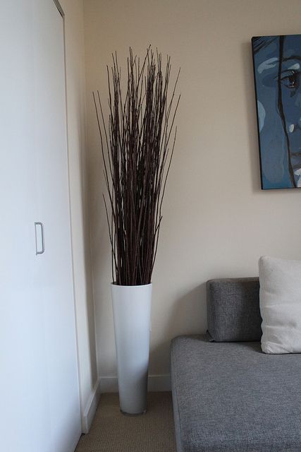 Decor Floor Vase by melaniequalls, via Flickr Tall Vases Decor Living Room, Floor Vase With Branches, Floor Vase With Cotton Stems, Corner Vase, Tall Vase With Twigs, Uocycled Floor Vase, Tall Vase With Reeds, Vases Decor Living Room, Kingdom Living