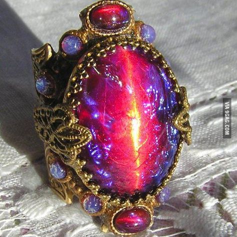 Dragons Breath: a type of Mexican Fire Opal, which looks like the Eye of Sauron or a magical lightning storm. Dragons Breath Fire Opal, Dragons Breath Opal, Dragons Breath, Mexican Fire Opal, Fire Opal Ring, Magical Jewelry, Tiffany Jewelry, Minerals And Gemstones, Rocks And Gems