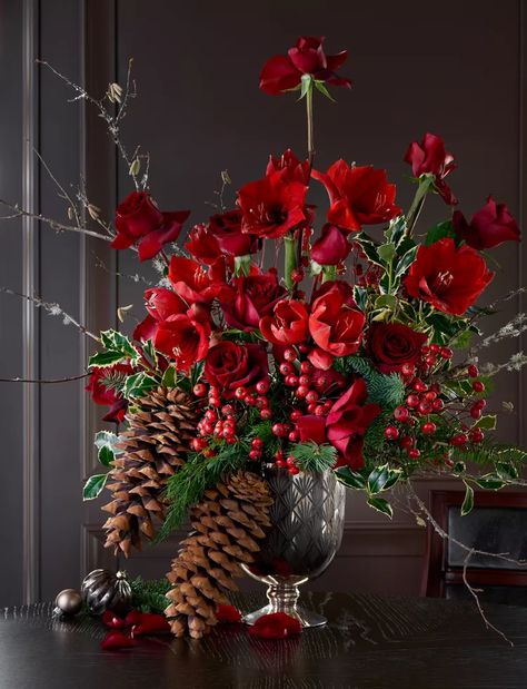 44 Christmas Centerpieces For Your Holiday Table Red Winter Flowers, Christmas Table Arrangements Floral, Holiday Floral Arrangements Christmas, Hotel Lobby Christmas Decor, Xmas Bouquets, Christmas Floral Centerpieces, Xmas Arrangements, Tablescape Holiday, Christmas Centrepiece Ideas