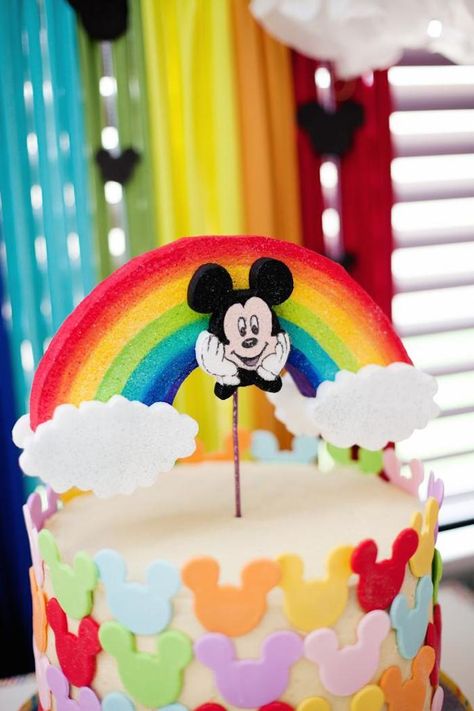 Rainbow Mickey Mouse birthday party via Kara's Party Ideas KarasPartyIdeas.com Printables, cake, favors, supplies, recipes, and more! #micke... Mickey Mouse Rainbow Cake, Rainbow Streamer Backdrop, Rainbow Jello Cups, Mickey Mouse Cake Pops, Mini Mouse Birthday Cake, Mickey Mouse Party Ideas, Rainbow Jello, Minnie Mouse Party Decorations, Mickey 1st Birthdays