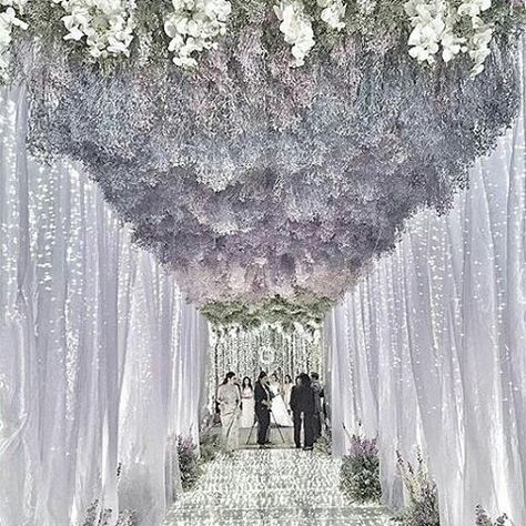 Dreamy decor of @rainforestthewedding with a light grey and violets floral tunnel. Talk about an entrance Wedding Tunnels, Purple Wedding Inspiration, Wedding Ceremony Flowers, Luxury Wedding Venues, Ceremony Flowers, Lavender Wedding, Wedding Stage, Wedding Ceremony Decorations, Star Wedding