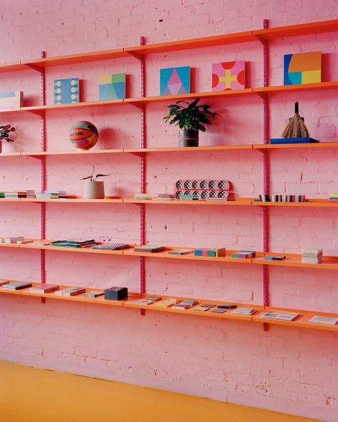 Yinka Ilori gives London studio colourful revamp Colored Wall Shelves, Colourful Shop Interior, Sandshult Ikea Hack, Colourful Office Space, Small Retail Shop Design, Cute Store Interior, Colourful Shelves, Wall Shelving Ideas, Colorful Shelves