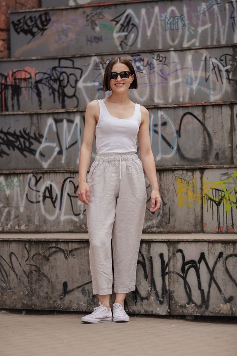 Experience the perfect blend of style and comfort with our High-Waisted Linen Pants. Perfect for casual or business casual wear, these pants smoothly taper to create a flattering silhouette. Not only will these be a chic addition to your capsule wardrobe, but you'll also be embracing sustainability with these eco-friendly wardrobe essentials. Flax Pants, High Waisted Linen Pants, Business Casual Wear, Summer Pants Women, Womens Pants, Linen Pants Women, Women Pants, Linen Trousers, Linen Pants