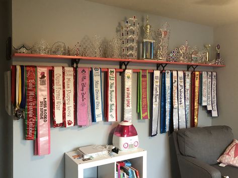 Pageant crown and sash display ❤️ Trophy Display Bedroom, Shelves For Pageant Crowns, Dance Competition Award Display, How To Display Pageant Crowns And Sashes, Pageant Display Ideas, Pageant Award Display, Pageant Crown And Sash Display, Pageant Sash Display, Dance Trophy Display Ideas