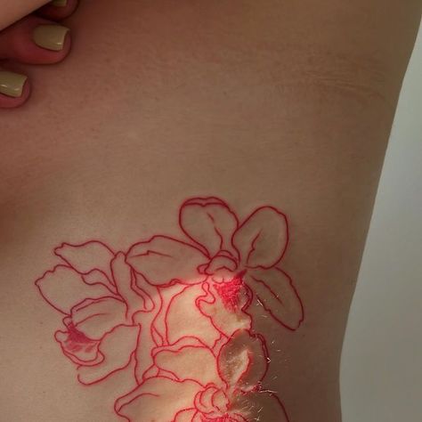 Tiny Tattoos Red Ink, Red Orchid Tattoo, Red Line Tattoos, Red Line Tattoo, Red Flower Tattoo, Red Tattoo Aesthetic, Paris Tattoo, Orchid Tattoo, Red Tattoo