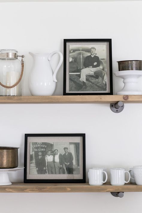 There's just one with framing treasured old photos: They're often super-small. Blogger Eden Passante enlarged and laminated the pictures to create this display.  See more (and find tips on restoring vintage pics) at Sugar and Charm »   - HouseBeautiful.com Photos Into Art, Photowall Ideas, Vintage Family Photos, Photograph Art, Display Family Photos, Old Family Photos, Decor Photography, Photo Display, Into Art