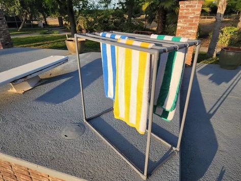 Easy and quick diy towel rack for pool. Learn how to make a standing towel rack for your pool. Pvc Pool Towel Rack, Pvc Towel Rack, Construction Hacks, Towel Rack Pool, Standing Towel Rack, Folding Hacks, Pvc Pool, Diy Towel Rack, Pool Stuff