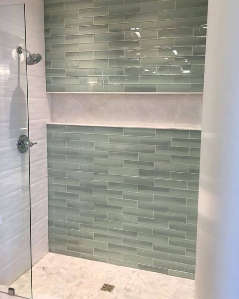 Green Tile Bathroom Shower Ideas, Bathroom Tile Mediterranean, Bathroom Interior Design Green Tiles, Shower Tile With One Accent Wall, Bathroom Alcove Storage, Beach Shower Tile Ideas, Aqua Shower Tile Ideas, Green Glass Subway Tile Bathroom, White Plaster Bathroom