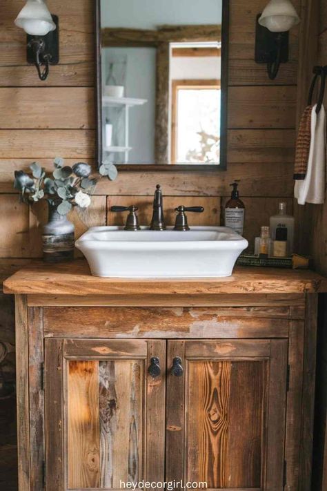 15 Amazing Rustic Farmhouse Bathroom Decor - Hey Decor Girl [Latest Trending Decor Design Ideas] Country Bathroom Ideas Farmhouse Rustic, Natural Wood Vanity Bathroom Farmhouse, Rustic Western Bathroom Ideas, Farmhouse Aesthetic Bathroom, Rustic Bathroom Cabinet Ideas, County Bathrooms, Master Bath Rustic, Modern Western Bathroom, Cabin Bathroom Ideas Rustic