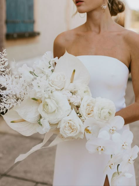 stunning all white wedding bouquet for the modern bride, or the bride seeking a classic wedding colour palette. click below to organise an appointment with our creative director for your wedding goals All White Floral Bridal Bouquet, Bridesmaid Bouquet With Orchids, Wedding White Flowers Bouquet, White Bouquet With Orchids, Boho Orchid Bouquet, Luxe Boho Wedding, White Wedding Flowers 2023, White Boho Bridal Bouquet, 2023 Wedding Bouquet