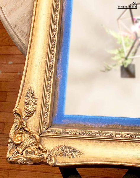 How to paint a mirror frame gold Repaint Mirror Frame Diy, Repainting Gold Mirror Frame, Painted Framed Mirror, Paint A Mirror Frame Gold, Gold Painted Mirror Frame, Vintage Mirror Decor Ideas, Painted Bathroom Mirror Frame, Painted Guilded Mirrors, Plain Mirror Makeover Diy