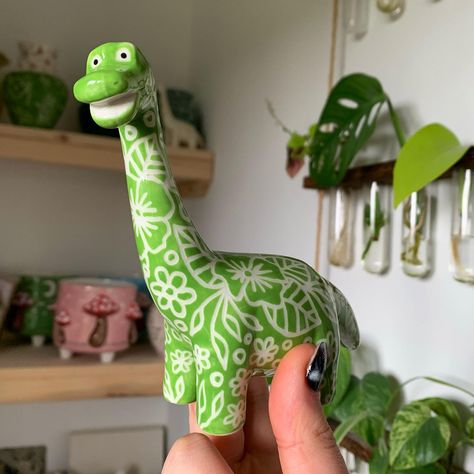 Dinosaur Pottery Painting Ideas, Dinosaur Pottery, Floral Dinosaur, Long Neck Dinosaur, Bio Art, Ceramics Pottery Art, Ceramics Pottery, Illustrators On Instagram, Ceramic Studio