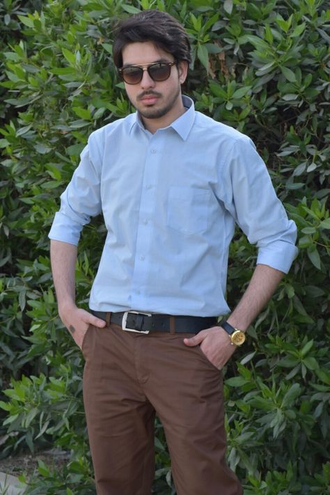 M. Sheheryar Naseer in a light blue shirt along with brown pant #MSheheryarNaseer #Sheheryar #SheheryarNaseer #Sunglasses #Rayban #Watch #Lightblueshirt #Brownpant #photography #man #male #men #menstyle #mensfashion #fashionformen #fashion Brown Pants Blue Shirt Men, Blue Shirt Brown Pants, Stylish Poses, Audition Outfit, Fall Bottoms, Stylish Mens Suits, Light Blue Shirt, Pants Outfit Men, Dark Men