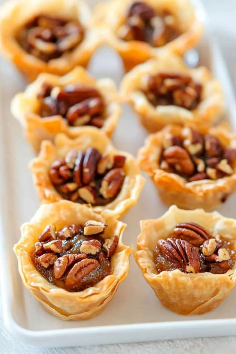 Pecan Pie Phyllo Cups, Pecan Pie Puff Pastry Bites, Easy Phyllo Desserts, Pecan Pie Tarts Mini Phyllo, Phyllo Pastry Cups Recipes, Fillo Cup Recipes Desserts, Dessert Phyllo Cups, Phyllo Cup Desserts Simple, Phyllo Pastry Desserts