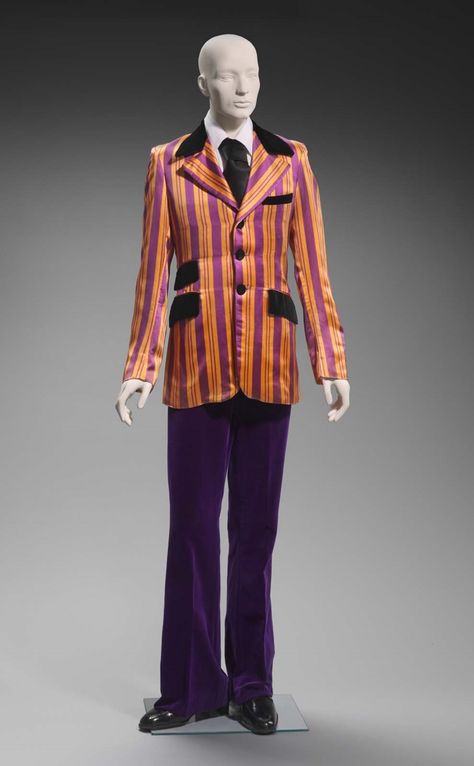 1970, Man's "dandy" jacket made of bright orange and purple striped satin, with black velvet collar, three velvet buttons down centre front, and three velvet flap pockets. By Granny Takes a Trip. Museum of Fine Art, Boston, USA. 1970s Mens Fashion, Boston Usa, Museum Of Fine Arts Boston, 60s 70s Fashion, Purple Suits, Velvet Collar, Fall Front, 60s Fashion, Museum Of Fine Arts