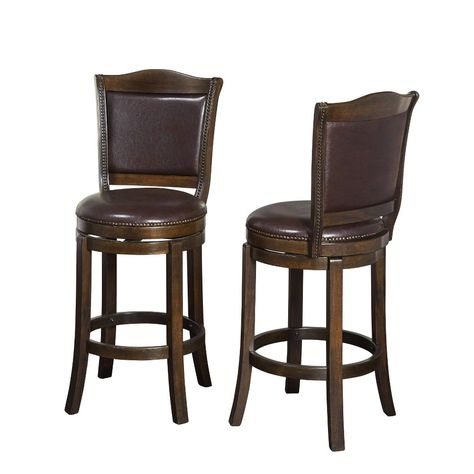 Give your interior decor a classic update with this Set of Two Swivel Stools from Buylateral. Each piece in this set of two brown swivel stools features a round faux-leather seat, a slanted back with faux-leather padding, nailhead-trim detailing and slightly curved legs. A built-in footrest bar provides added comfort, making these nailhead-trim stools an elegant option for nearly any room in your home. The swivel design gives you a range of movement whether you're eating breakfast or entertainin Pub Stools, Brown Bar Stools, Patterned Armchair, Leather Counter Stools, 30 Bar Stools, Upholstered Stool, Swivel Stool, Counter Height Bar Stools, Swivel Seating