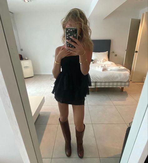 Black Mini Dress And Cowboy Boots, Black Dress Western Boots Outfit, Strapless Dress With Cowboy Boots, Sun Dresses And Cowboy Boots, Black Dress Brown Cowboy Boots, Short Dress Cowboy Boots, Short Dress With Cowboy Boots, Black Dress With Cowboy Boots, Black Dress And Cowboy Boots