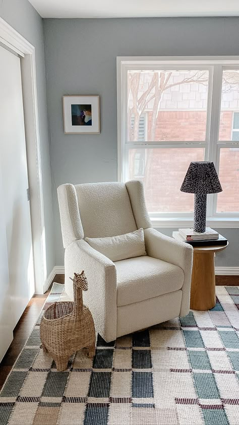 Glider in corner by window and closet for a modern nursery design. Paired with a side table and basket book storage for reading. Modern Baby Boy Nursery, Neutral Boy Nursery, Blue Gray Nursery, Boy Nursery Design, Light Blue Nursery, Modern Boy Nursery, Baby Blue Nursery, Nursery Guest Room, Blue Nursery Boy