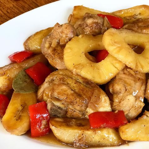 Chicken Estofado is a Filipino dish made with chicken stewed in soy sauce, vinegar, pineapple juice and cooked with fried potatoes, cooking banana and bell peppers. Chicken Recipe Filipino, Chicken Menudo, Filipino Party Food, Filipino Chicken Recipes, Chicken Caldereta, Estofado Recipe, Chicken Recipes Pinoy, Chicken Recipes Filipino, Recipe Filipino Food