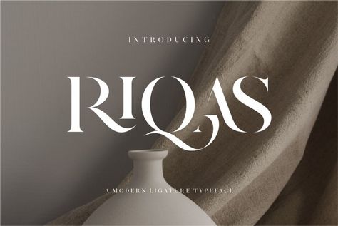 Riqas Ligature Serif Font inspired by the famous minimalist logo perfect for the purposes of designing templates, brochures, videos, advertising branding, logos, invitation, layout design, elegant crafting, beauty design and more. Try before you buy Riqas font for iOS, Android, macOS, or Windows for free, or you can download the full version with a commercial […] Get your free download of the Riqas Font now at FreeFontDL - Free Font Download! Elegant Fonts For Logo, Free Branding Fonts, Elegant Free Fonts, Ligatures Typography, Font For Logo Design, Minimalist Typeface, Elegant Fonts Free, Beauty Font, Ligature Font